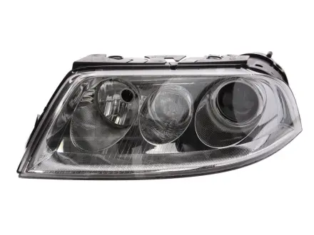 VW Фара основна Bi-Xenon з мотором,без газор.лампи,з лампами накал.D2S/H7 PY21W W5W лів.Passat 00- HELLA 1EL 008 340-071