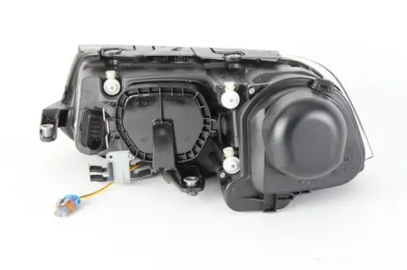 VW Фара основна Bi-Xenon з мотором,без газор.лампи,з лампами накал.D2S/H7 PY21W W5W прав.Passat 00- HELLA 1EL 008 340-081