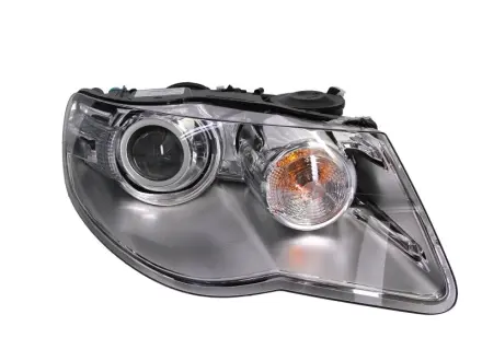 VW Фара основна Bi- Xenon без газоразр.лампи D1S/H7 прав.Touareg 02-10 HELLA 1ZS 009 452-141