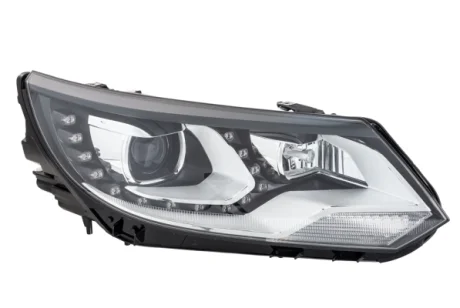 VW Основна фара прав. TIGUAN 07- HELLA 1ZS 010 748-321