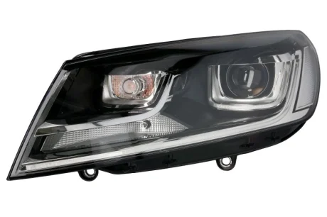 VW Фара основна Bi-Xenon 6 функций з мотором,без газ.лампи,без предвкл.аппарата,D3S W5W WY21W лів.Touareg 14 Hella 1ZT 011 937-511
